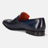 A blue Men's bugatti Kiltie Loafer featuring a round toe wingcap, stacked heel. Made from premium genuine leather with a durable leather outsole, this buckle design offers both style and comfort.