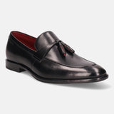 A black Men's bugatti Tassel Loafers featuring a round apron toe, stacked heel. Made from premium genuine leather with a durable leather outsole, this slip-on design offers both style and comfort.