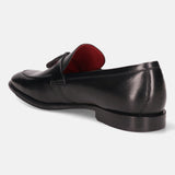 A black Men's bugatti Tassel Loafers featuring a round apron toe, stacked heel. Made from premium genuine leather with a durable leather outsole, this slip-on design offers both style and comfort.