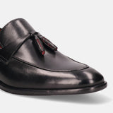 A black Men's bugatti Tassel Loafers featuring a round apron toe, stacked heel. Made from premium genuine leather with a durable leather outsole, this slip-on design offers both style and comfort.