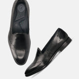 A black Men's bugatti Venetian Loafers featuring a round toe plain toe, stacked heel. Made from premium genuine leather with a durable leather outsole, this slip-on design offers both style and comfort.