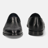A black Men's bugatti Venetian Loafers featuring a round toe plain toe, stacked heel. Made from premium genuine leather with a durable leather outsole, this slip-on design offers both style and comfort.