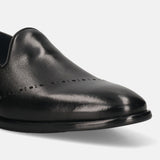 A black Men's bugatti Venetian Loafers featuring a round toe plain toe, stacked heel. Made from premium genuine leather with a durable leather outsole, this slip-on design offers both style and comfort.