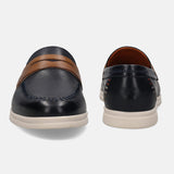 A blue Men's bugatti Loafers featuring a round apron toe, zero heels heel. Made from premium genuine leather with a durable tpr outsole, this slip-on design offers both style and comfort.