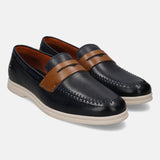 A blue Men's bugatti Loafers featuring a round apron toe, zero heels heel. Made from premium genuine leather with a durable tpr outsole, this slip-on design offers both style and comfort.
