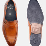 A yellow Men's bugatti Penny Loafer featuring a round apron toe, moulded  heel. Made from premium genuine leather with a durable high quality synthetic outsole, this slip-on design offers both style and comfort.