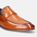 A yellow Men's bugatti Penny Loafer featuring a round apron toe, moulded  heel. Made from premium genuine leather with a durable high quality synthetic outsole, this slip-on design offers both style and comfort.