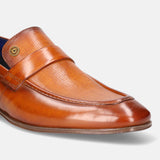 A yellow Men's bugatti Penny Loafer featuring a round apron toe, moulded  heel. Made from premium genuine leather with a durable high quality synthetic outsole, this slip-on design offers both style and comfort.