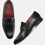 A black Men's bugatti Bit Loafer featuring a round toe apron toe, moulded heel. Made from premium genuine leather with a durable high quality synthetic outsole, this slip-on design offers both style and comfort.