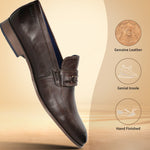 A brown Men's bugatti Bit Loafer featuring a round toe apron toe, moulded  heel. Made from premium genuine leather with a durable high quality synthetic outsole, this slip-on design offers both style and comfort.