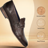 A brown Men's bugatti Bit Loafer featuring a round toe apron toe, moulded  heel. Made from premium genuine leather with a durable high quality synthetic outsole, this slip-on design offers both style and comfort.