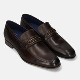 A brown Men's bugatti Bit Loafer featuring a round toe apron toe, moulded  heel. Made from premium genuine leather with a durable high quality synthetic outsole, this slip-on design offers both style and comfort.