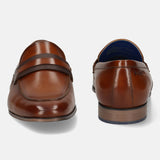 Men's Bugatti penny loafer cognac leather shoes with a round toe and apron toe featuring a moulded heel , a pvc outsole.