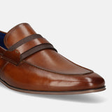 Men's Bugatti penny loafer cognac leather shoes with a round toe and apron toe featuring a moulded heel , a pvc outsole.
