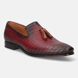 A grey Men's bugatti Tassel Loafers featuring a round toe plain toe, stacked heel. Made from premium genuine leather with a durable high quality synthetic outsole, this slip-on design offers both style and comfort.