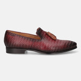 A grey Men's bugatti Tassel Loafers featuring a round toe plain toe, stacked heel. Made from premium genuine leather with a durable high quality synthetic outsole, this slip-on design offers both style and comfort.
