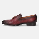 A grey Men's bugatti Tassel Loafers featuring a round toe plain toe, stacked heel. Made from premium genuine leather with a durable high quality synthetic outsole, this slip-on design offers both style and comfort.