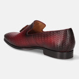A grey Men's bugatti Tassel Loafers featuring a round toe plain toe, stacked heel. Made from premium genuine leather with a durable high quality synthetic outsole, this slip-on design offers both style and comfort.