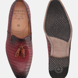 A grey Men's bugatti Tassel Loafers featuring a round toe plain toe, stacked heel. Made from premium genuine leather with a durable high quality synthetic outsole, this slip-on design offers both style and comfort.