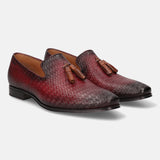 A grey Men's bugatti Tassel Loafers featuring a round toe plain toe, stacked heel. Made from premium genuine leather with a durable high quality synthetic outsole, this slip-on design offers both style and comfort.