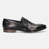 A black Men's bugatti Bit Loafer featuring a round toe apron toe, stacked heel. Made from premium genuine leather with a durable high quality synthetic outsole, this slip-on design offers both style and comfort.