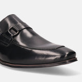A black Men's bugatti Bit Loafer featuring a round toe apron toe, stacked heel. Made from premium genuine leather with a durable high quality synthetic outsole, this slip-on design offers both style and comfort.