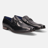 A black Men's bugatti Bit Loafer featuring a round toe apron toe, stacked heel. Made from premium genuine leather with a durable high quality synthetic outsole, this slip-on design offers both style and comfort.