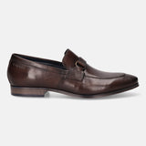 A brown Men's bugatti Bit Loafer featuring a round toe apron toe, stacked heel. Made from premium genuine leather with a durable high quality synthetic outsole, this slip-on design offers both style and comfort.
