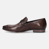 A brown Men's bugatti Bit Loafer featuring a round toe apron toe, stacked heel. Made from premium genuine leather with a durable high quality synthetic outsole, this slip-on design offers both style and comfort.