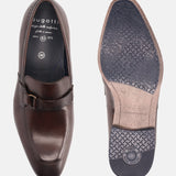 A brown Men's bugatti Bit Loafer featuring a round toe apron toe, stacked heel. Made from premium genuine leather with a durable high quality synthetic outsole, this slip-on design offers both style and comfort.