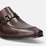 A brown Men's bugatti Bit Loafer featuring a round toe apron toe, stacked heel. Made from premium genuine leather with a durable high quality synthetic outsole, this slip-on design offers both style and comfort.