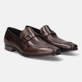 A brown Men's bugatti Bit Loafer featuring a round toe apron toe, stacked heel. Made from premium genuine leather with a durable high quality synthetic outsole, this slip-on design offers both style and comfort.