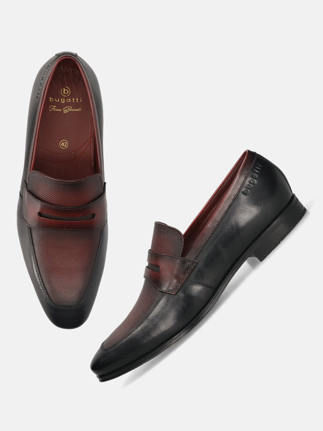 A black Men's bugatti Penny Loafer featuring a round toe apron toe, moulded  heel. Made from premium genuine leather with a durable high quality synthetic outsole, this slip-on design offers both style and comfort.
