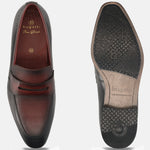 A black Men's bugatti Penny Loafer featuring a round toe apron toe, moulded  heel. Made from premium genuine leather with a durable high quality synthetic outsole, this slip-on design offers both style and comfort.