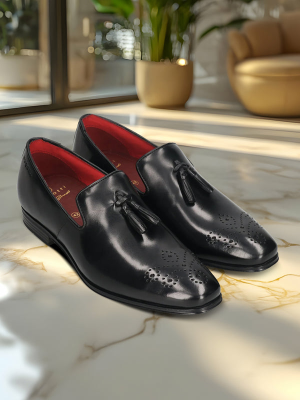 A black Men's bugatti Tassel Loafers featuring a round toe plain toe, moulded  heel. Made from premium genuine leather with a durable high quality synthetic outsole, this slip-on design offers both style and comfort.