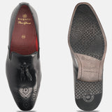A black Men's bugatti Tassel Loafers featuring a round toe plain toe, moulded heel. Made from premium genuine leather with a durable high quality synthetic outsole, this slip-on design offers both style and comfort.
