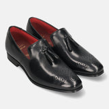 A black Men's bugatti Tassel Loafers featuring a round toe plain toe, moulded heel. Made from premium genuine leather with a durable high quality synthetic outsole, this slip-on design offers both style and comfort.