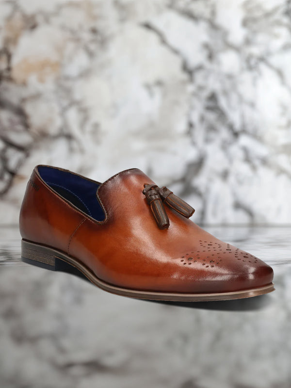 A cognac Men's bugatti Tassel Loafers featuring a round toe plain toe, moulded  heel. Made from premium genuine leather with a durable high quality synthetic outsole, this slip-on design offers both style and comfort.