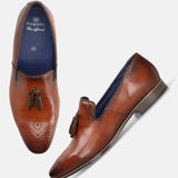 A cognac Men's bugatti Tassel Loafers featuring a round toe plain toe, moulded heel. Made from premium genuine leather with a durable high quality synthetic outsole, this slip-on design offers both style and comfort.