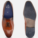 A cognac Men's bugatti Tassel Loafers featuring a round toe plain toe, moulded heel. Made from premium genuine leather with a durable high quality synthetic outsole, this slip-on design offers both style and comfort.