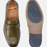A green Men's bugatti Penny Loafer featuring a round apron toe, moulded heel. Made from premium genuine leather with a durable tr outsole, this slip-on design offers both style and comfort.
