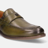 A green Men's bugatti Penny Loafer featuring a round apron toe, moulded heel. Made from premium genuine leather with a durable tr outsole, this slip-on design offers both style and comfort.