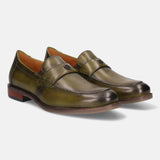 A green Men's bugatti Penny Loafer featuring a round apron toe, moulded heel. Made from premium genuine leather with a durable tr outsole, this slip-on design offers both style and comfort.