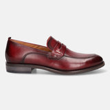 A grey Men's bugatti Penny Loafer featuring a round apron toe, moulded heel. Made from premium genuine leather with a durable tr outsole, this slip-on design offers both style and comfort.