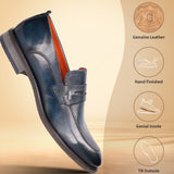 A blue Men's bugatti Penny Loafer featuring a round apron toe, moulded heel. Made from premium genuine leather with a durable tr outsole, this slip-on design offers both style and comfort.