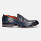 A blue Men's bugatti Penny Loafer featuring a round apron toe, moulded heel. Made from premium genuine leather with a durable tr outsole, this slip-on design offers both style and comfort.