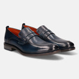 A blue Men's bugatti Penny Loafer featuring a round apron toe, moulded heel. Made from premium genuine leather with a durable tr outsole, this slip-on design offers both style and comfort.