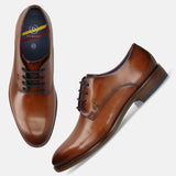 Men's Bugatti derby cognac leather shoes with a round toe and plain toe featuring a moulded heel , a tpr outsole , and laces fastening.