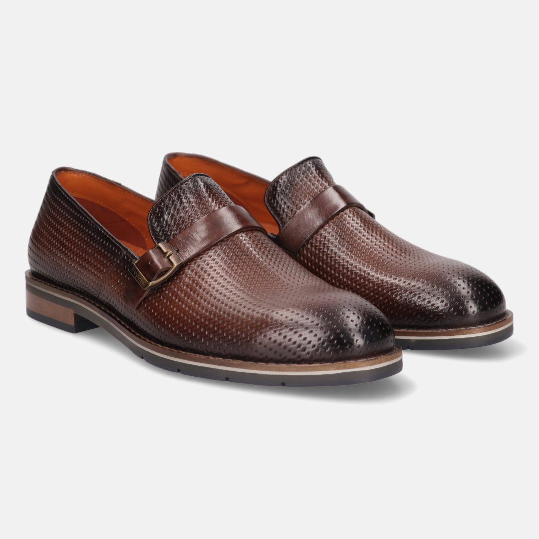 A brown Men's bugatti Penny Loafer featuring a round plain toe, moulded  heel, and a wide fit. Made from premium genuine leather with a durable tr outsole, this slip-on design offers both style and comfort.