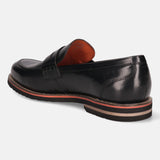 A black Men's bugatti Penny Loafer featuring a round apron toe, stacked heel, and a extra wide fit. Made from premium genuine leather with a durable eva outsole, this slip-on design offers both style and comfort.